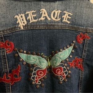 Crop embroidered jean jacket. 18 in across chest, 24 in sleeve, 14 inches long